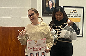 Two ladies making a presentation at the board meeting